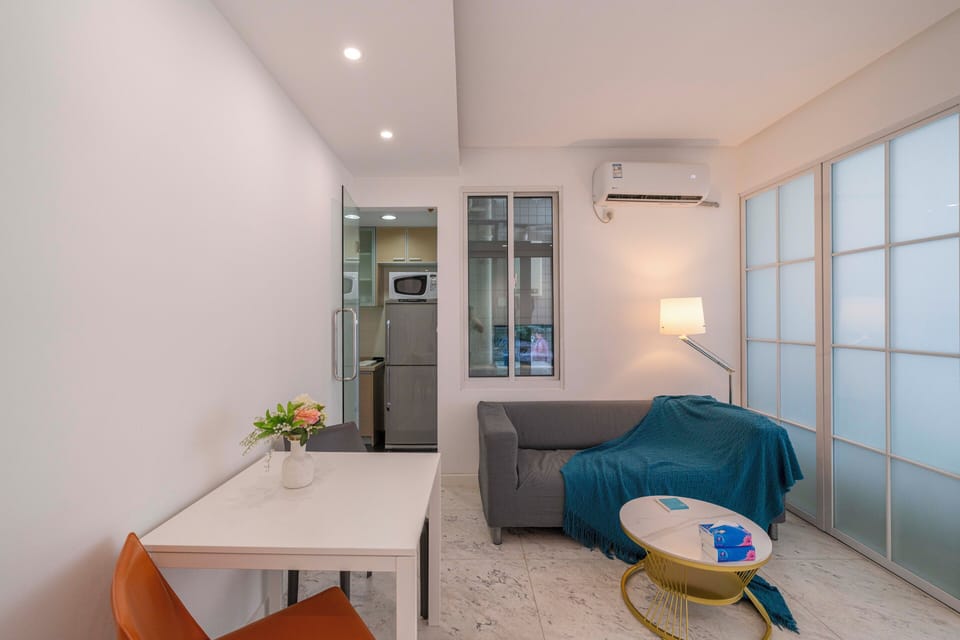 Superior Apartment, 1 Bedroom, Microwave, City View | Living room | 55-inch Smart TV with cable channels