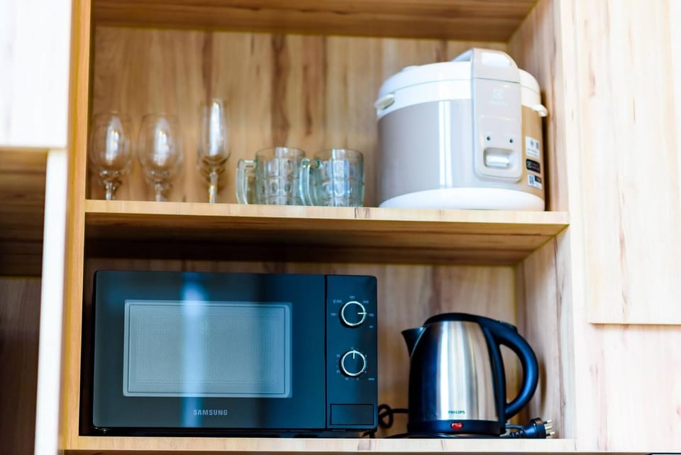Villa, Pool View | Private kitchen | Full-size fridge, microwave, stovetop, electric kettle