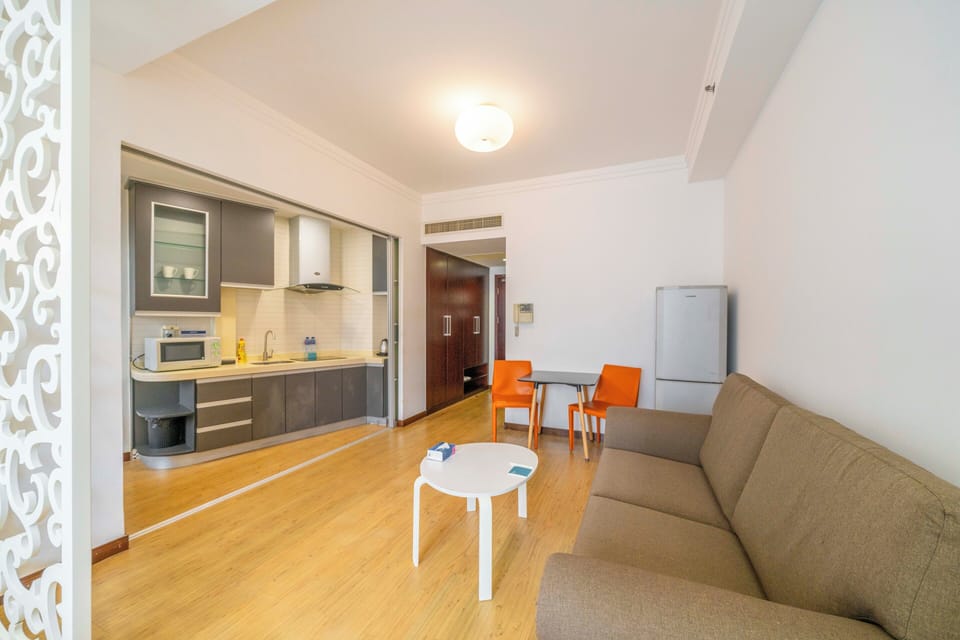 Superior Apartment, 1 Bedroom, Kitchen, City View | Living room | 55-inch Smart TV with cable channels
