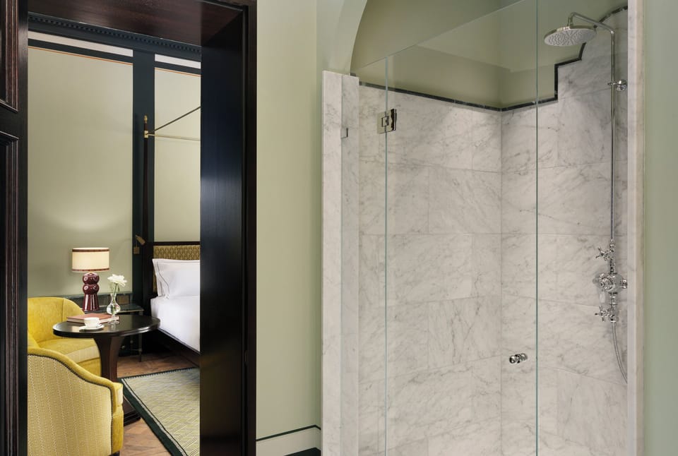 Superior Double Room, City View | Bathroom | Shower, free toiletries, hair dryer, slippers