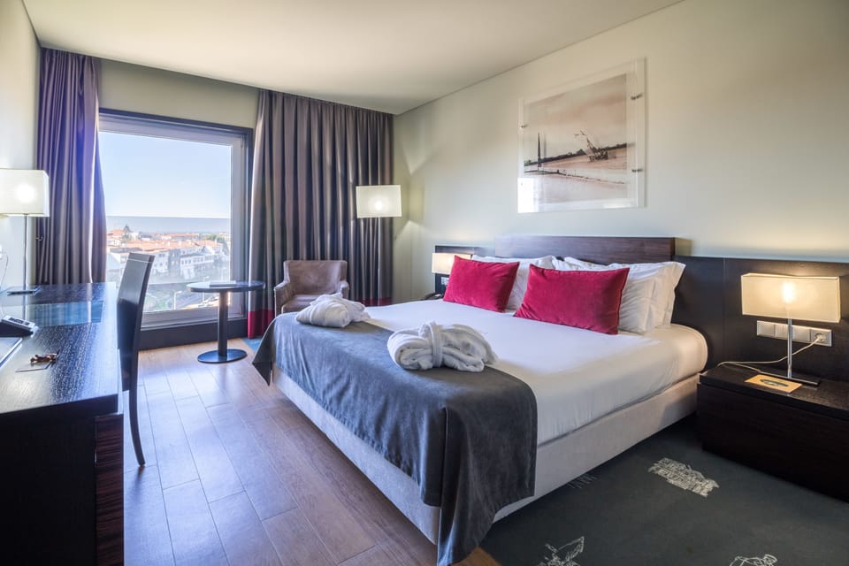 Premium Room (Ria Views) | Minibar, in-room safe, desk, blackout drapes