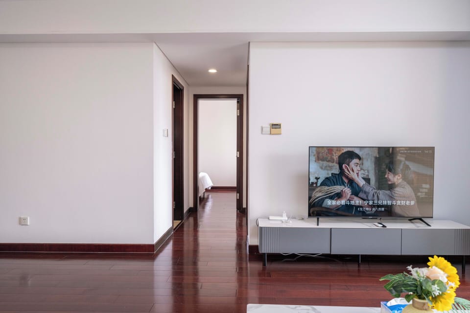 Superior Apartment, 2 Bedrooms, Kitchen, City View | Living room | 55-inch Smart TV with cable channels
