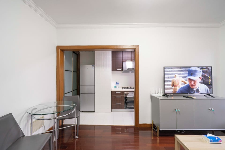 Superior Apartment, 1 Bedroom, Kitchen, City View | Living room | 55-inch Smart TV with cable channels