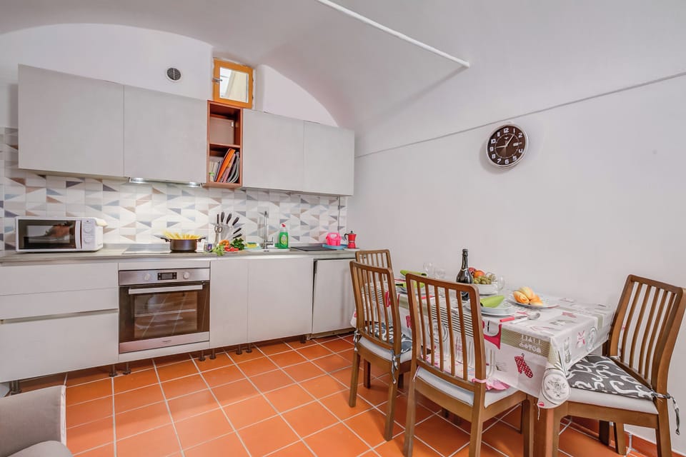 Standard Apartment, Multiple Bedrooms (La Casa Di Rosy E Adri) | Private kitchen | Fridge, microwave, oven, stovetop