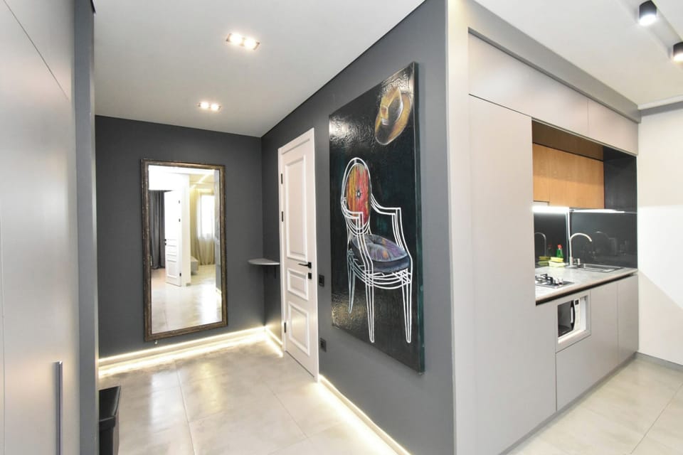 Superior Apartment, 1 Bedroom | Living area | 50-inch flat-screen TV with cable channels
