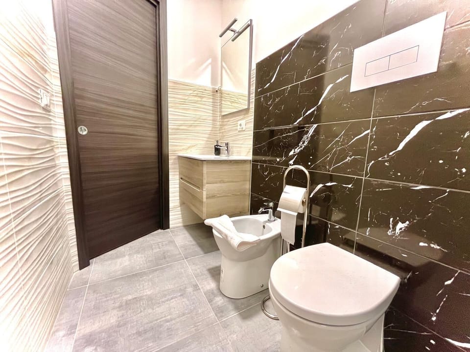 Classic Double Room, Balcony, Partial Sea View | Bathroom | Shower, free toiletries, hair dryer, bidet