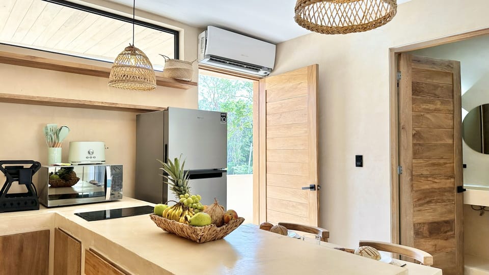 Deluxe Apartment, Balcony, Pool View | Private kitchen | Microwave, stovetop, cookware/dishes/utensils