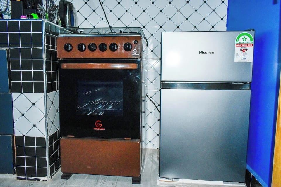 Family Apartment, City View | Private kitchen | Fridge, microwave, cookware/dishes/utensils