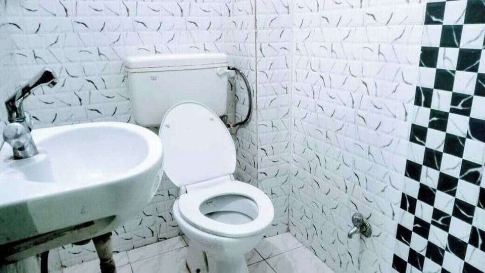 Shower, rainfall showerhead, slippers, towels