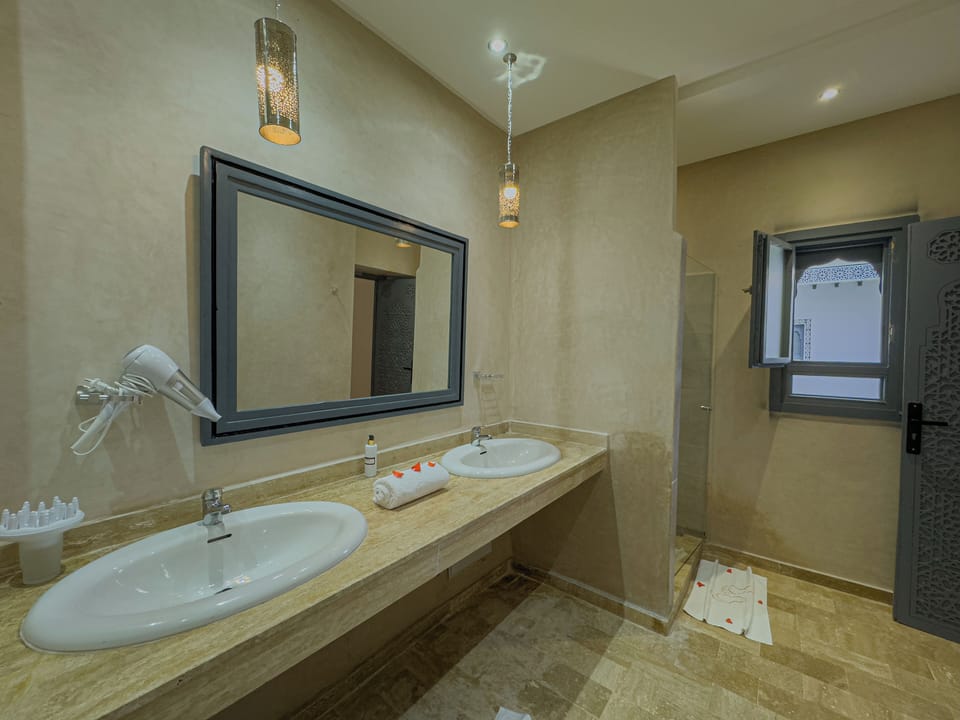 Superior Double Room, Patio, Courtyard View | Bathroom | Shower, hair dryer, bathrobes, slippers