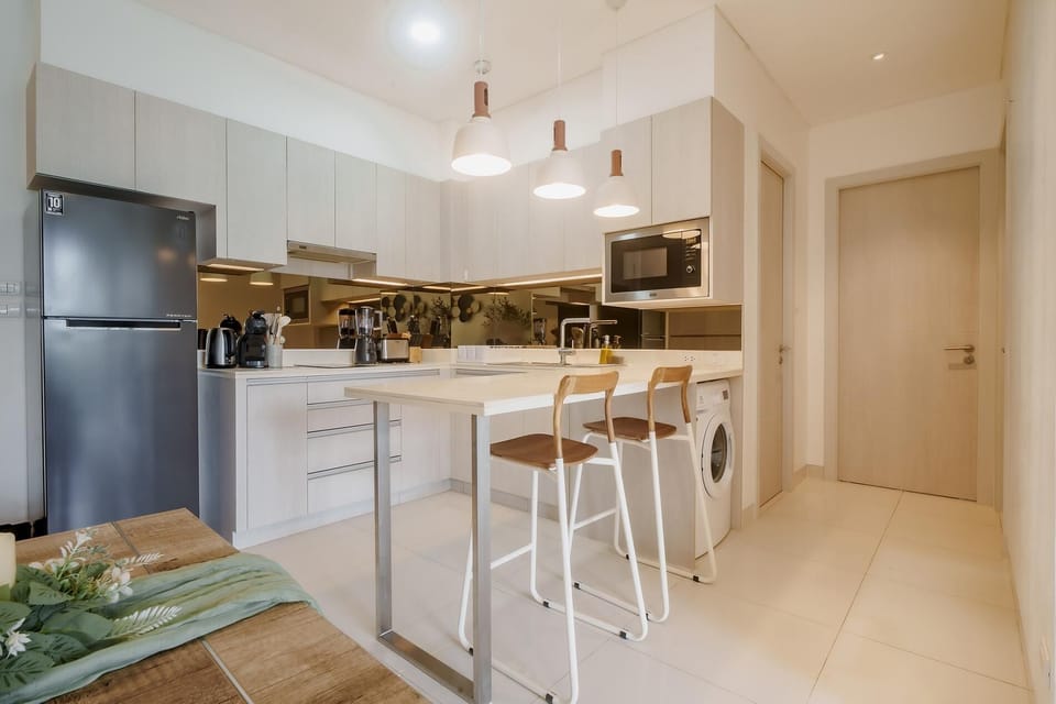 Apartment (2 Bedrooms) | Private kitchen | Microwave, highchair, blender, spices
