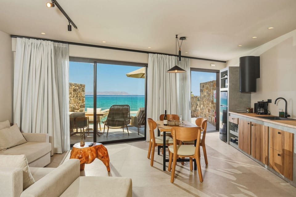 Seafront One Bedroom Cave Suite with Private Pool | Living area | Smart TV