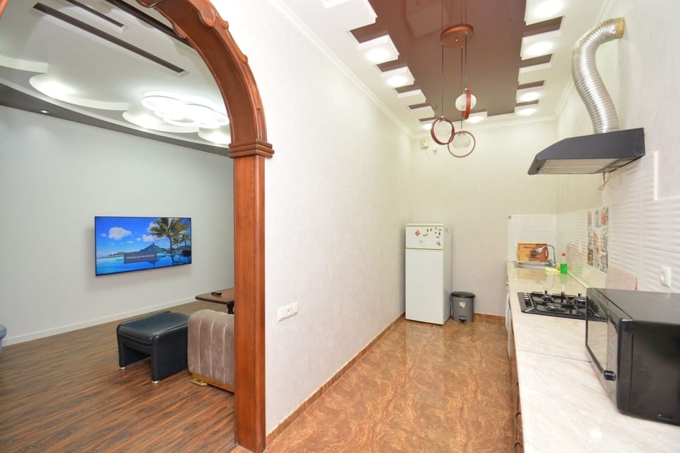 Classic Apartment, 2 Bedrooms | Private kitchen | Full-size fridge, microwave, stovetop, electric kettle