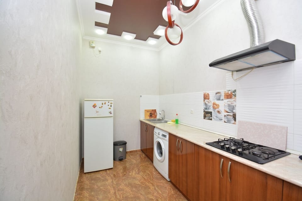 Classic Apartment, 2 Bedrooms | Private kitchen | Full-size fridge, microwave, stovetop, electric kettle