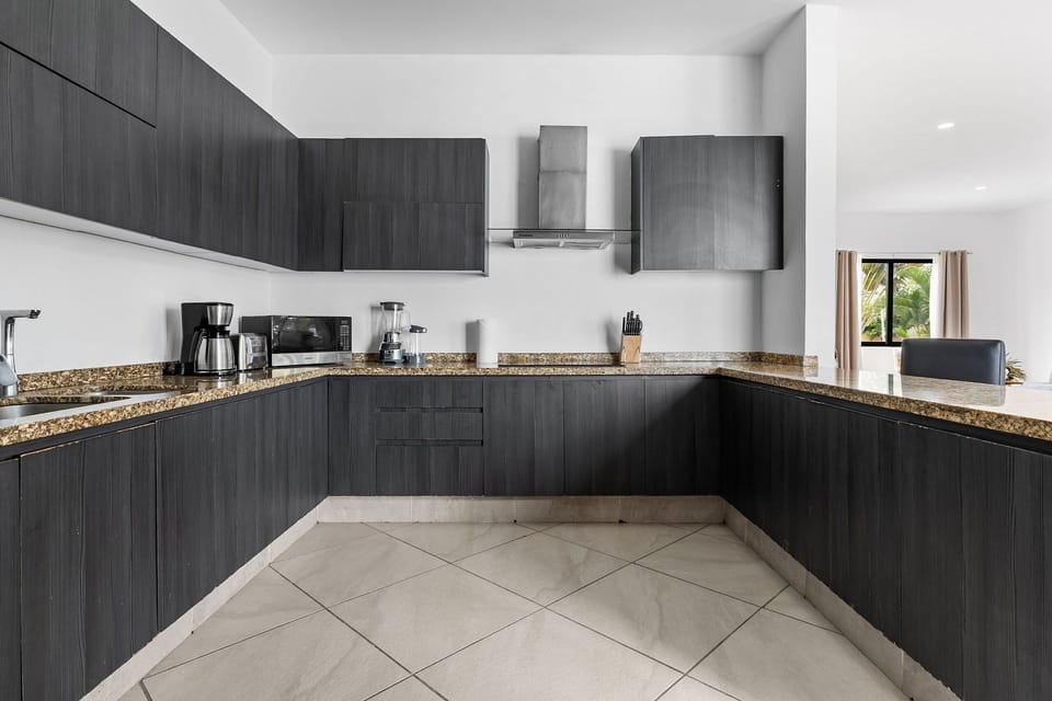 Villa | Private kitchen | Fridge, microwave, oven, stovetop