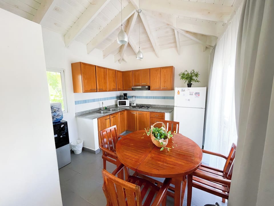 Deluxe Suite, 2 Bedrooms, Kitchen, Ocean View | Private kitchen | Fridge, microwave, stovetop, coffee/tea maker