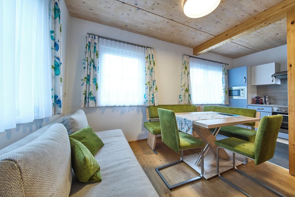 Comfort Condo, 2 Bedrooms, Pets Allowed, Garden View | Living area | 50-inch flat-screen TV with cable channels