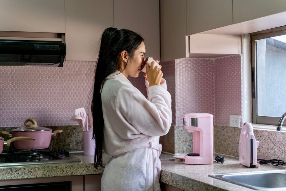 Designer apartment, city views, Pink Fantasy | Private kitchen | Coffee/tea maker, griddle, cleaning supplies