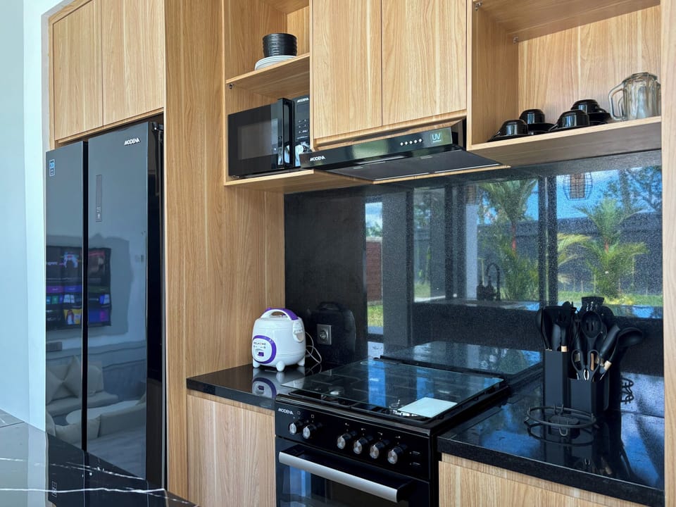 Two-Bedroom Villa | Private kitchen | Full-size fridge, microwave, stovetop, cookware/dishes/utensils