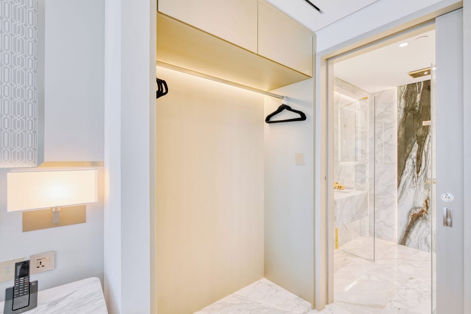 Luxury Studio, Balcony, City View | Bathroom | Combined shower/tub, hair dryer, towels, soap