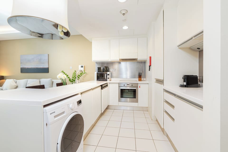 Luxury Apartment, Balcony, City View | Private kitchen | Full-size fridge, microwave, oven, stovetop