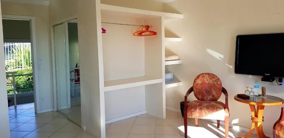 Luxury Studio Suite, Balcony, Sea View | In-room safe, blackout drapes, soundproofing, iron/ironing board