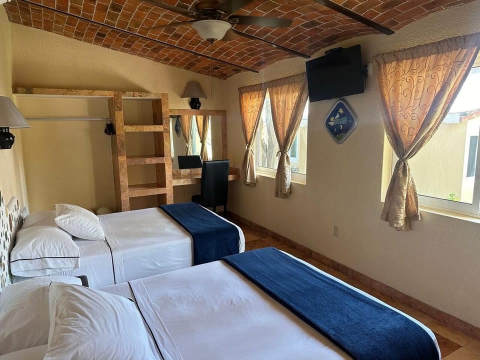 Family Studio, 2 Bedrooms, Ground Floor | Bed sheets