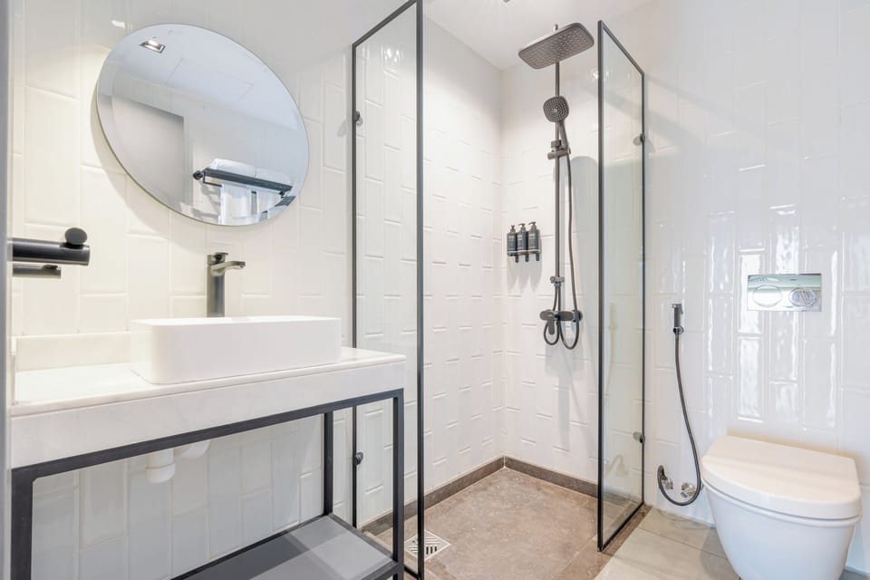 Studio | Bathroom | Shower, slippers, towels, soap