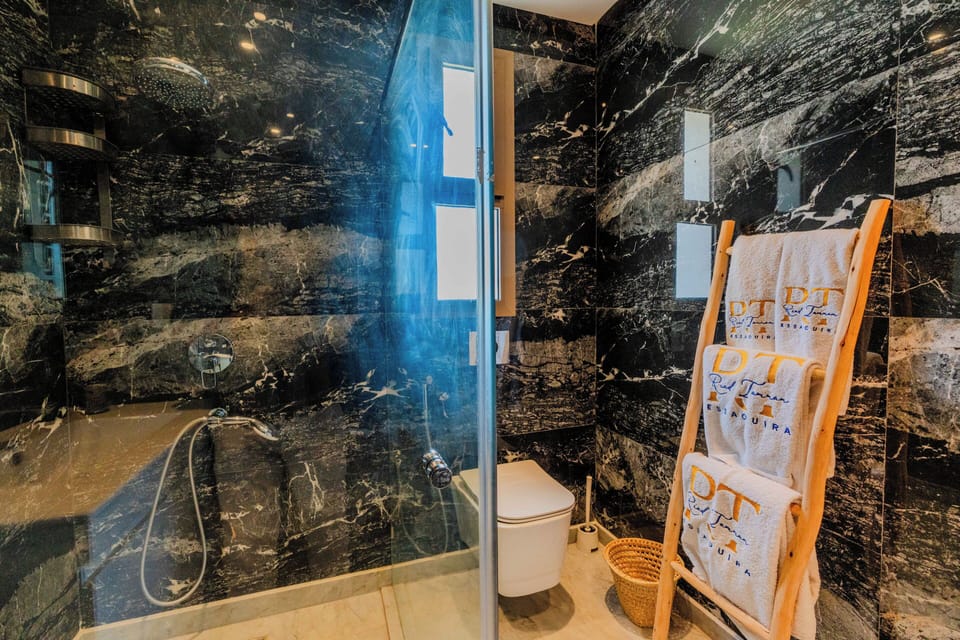Luxury Suite, Pool View | Bathroom | Shower, hair dryer, towels, soap