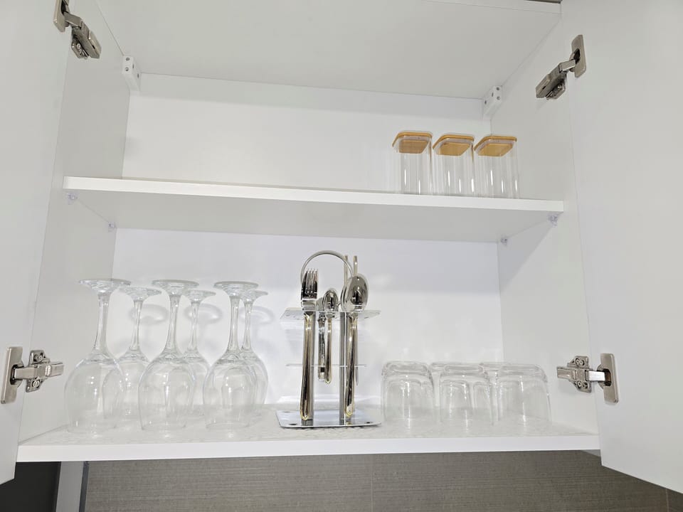 Luxury Apartment, Balcony, City View | Private kitchen | Full-size fridge, microwave, oven, cookware/dishes/utensils