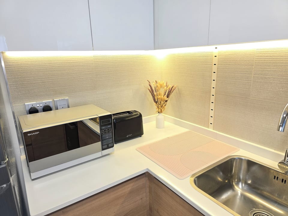 Luxury Apartment, Balcony, City View | Private kitchen | Full-size fridge, microwave, oven, cookware/dishes/utensils