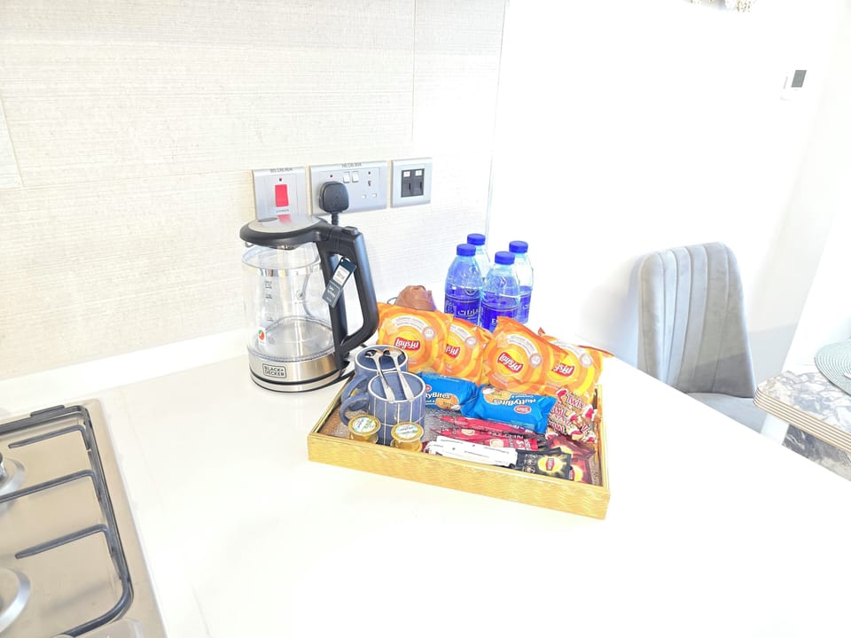 Luxury Apartment, Balcony, City View | Private kitchen | Full-size fridge, microwave, oven, cookware/dishes/utensils