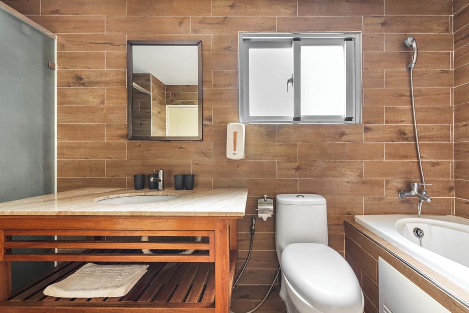 Duplex Quadruple Room | Bathroom | Hair dryer, slippers, towels, shampoo