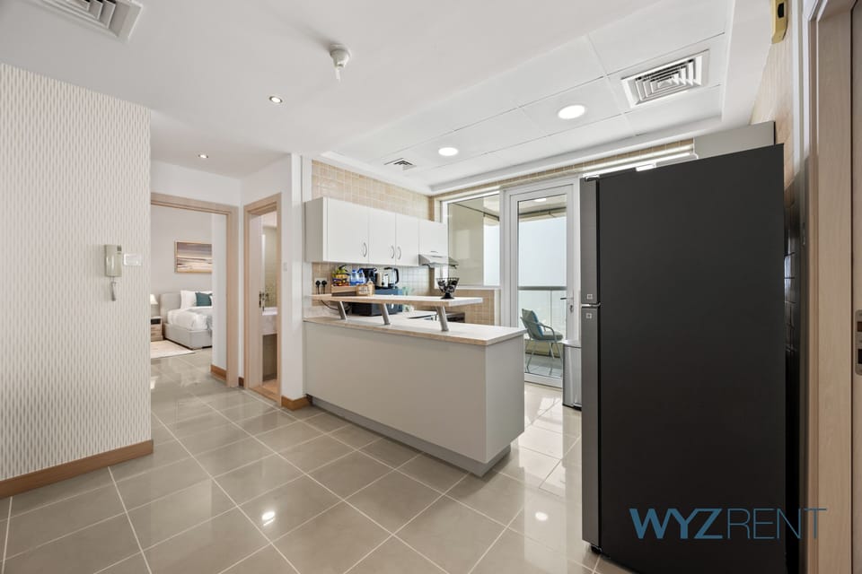 Apartment, Sea View | Private kitchen | Full-size fridge, microwave, oven, stovetop