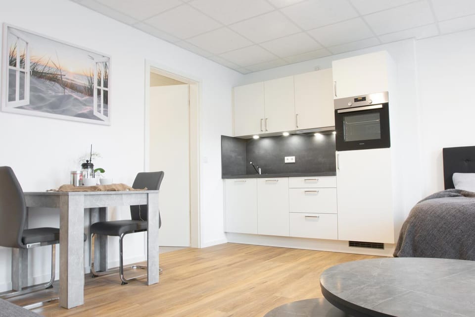 Comfort Apartment, Resort View | Private kitchen | Fridge, microwave, stovetop, dishwasher