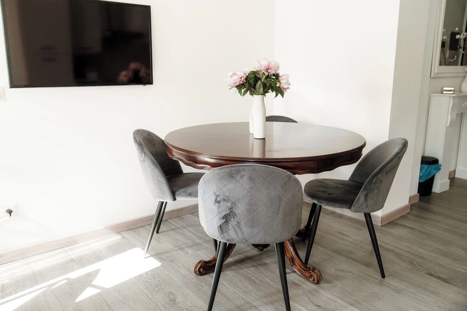 Apartment, City View | Living area | Flat-screen TV