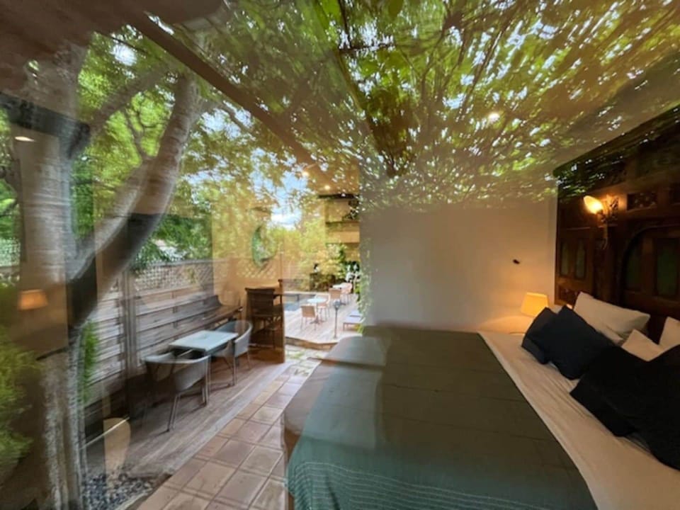 Deluxe Room, Patio, Garden View | Soundproofing, free WiFi