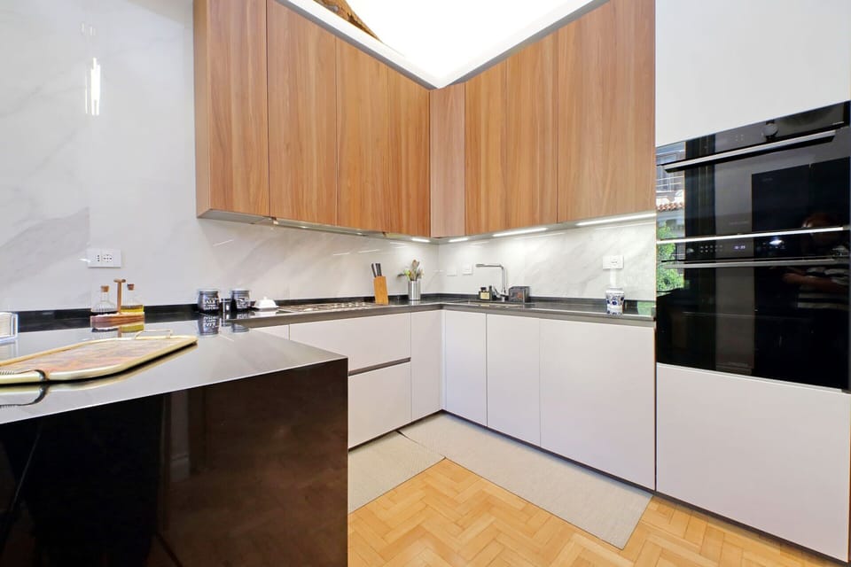 Apartment | Private kitchen | Highchair, cleaning supplies