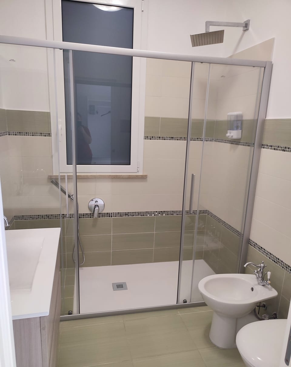 Standard Double Room, Patio, Courtyard View | Bathroom | Shower, free toiletries, hair dryer, bidet