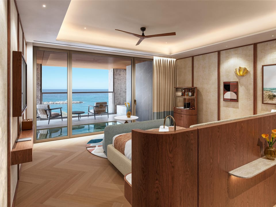 Junior Suite, 1 King Bed, Sea View (Pool) | Minibar, in-room safe, individually decorated, individually furnished