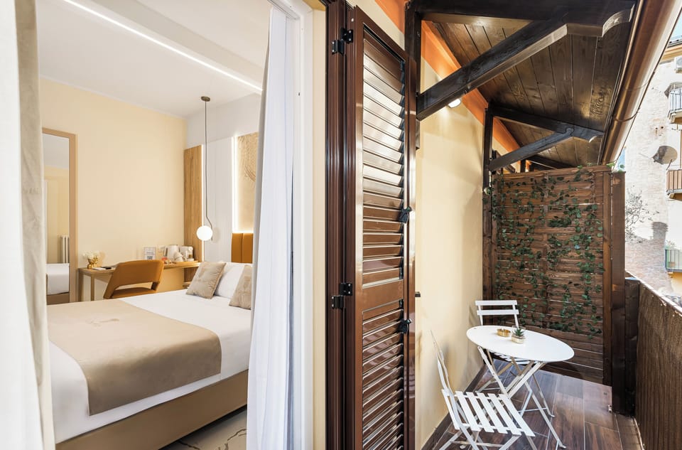 Double Room, Balcony, Courtyard View | In-room safe, desk, laptop workspace, blackout drapes