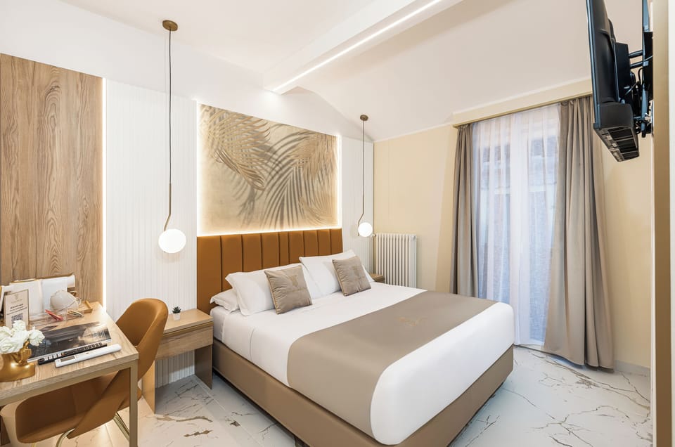 Double Room, Balcony, Courtyard View | In-room safe, desk, laptop workspace, blackout drapes
