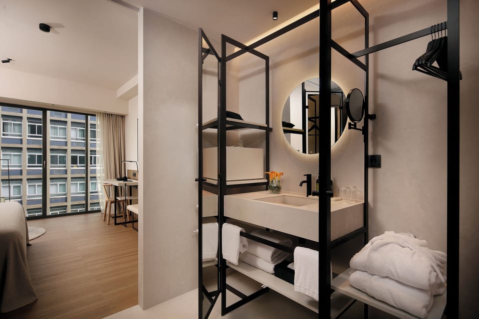 Superior Room | Bathroom | Hair dryer, slippers, towels, soap