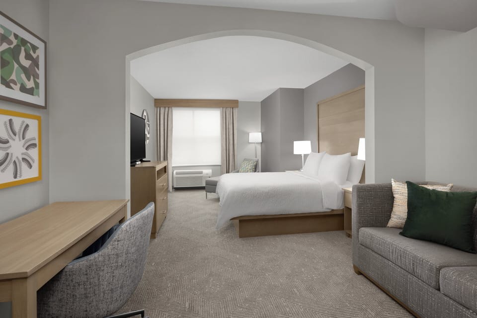 Suite, 1 Queen Bed | In-room safe, individually decorated, individually furnished, desk