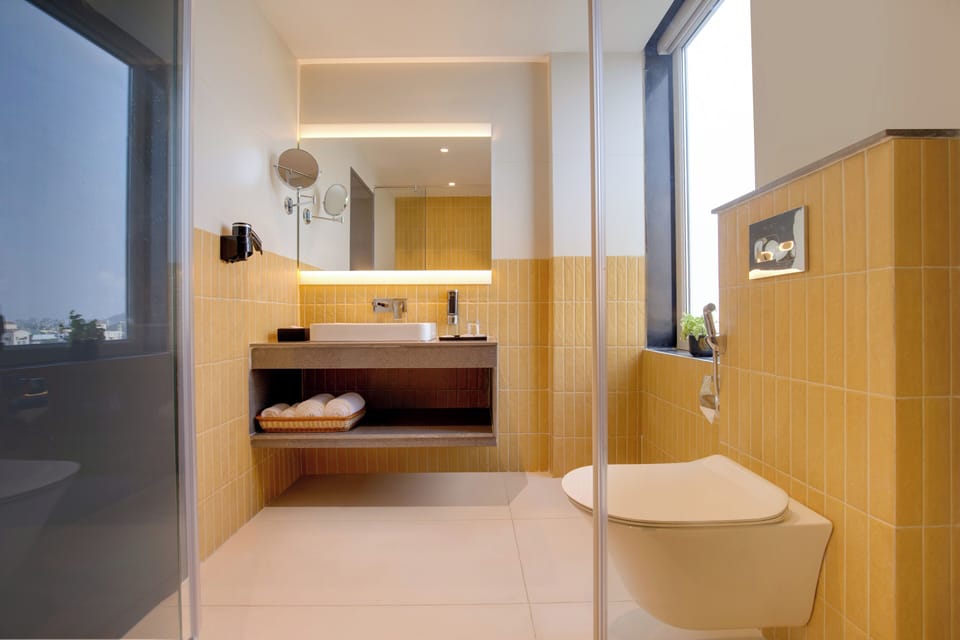 Deluxe Double Room | Bathroom | Shower, hair dryer, towels, soap