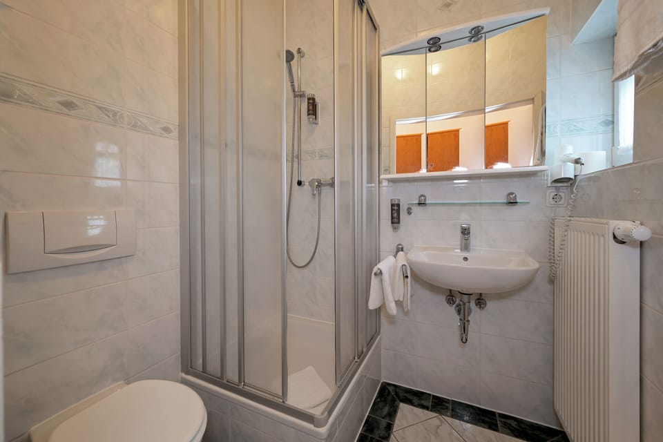 Double Room | Bathroom | Shower, hair dryer, towels, soap