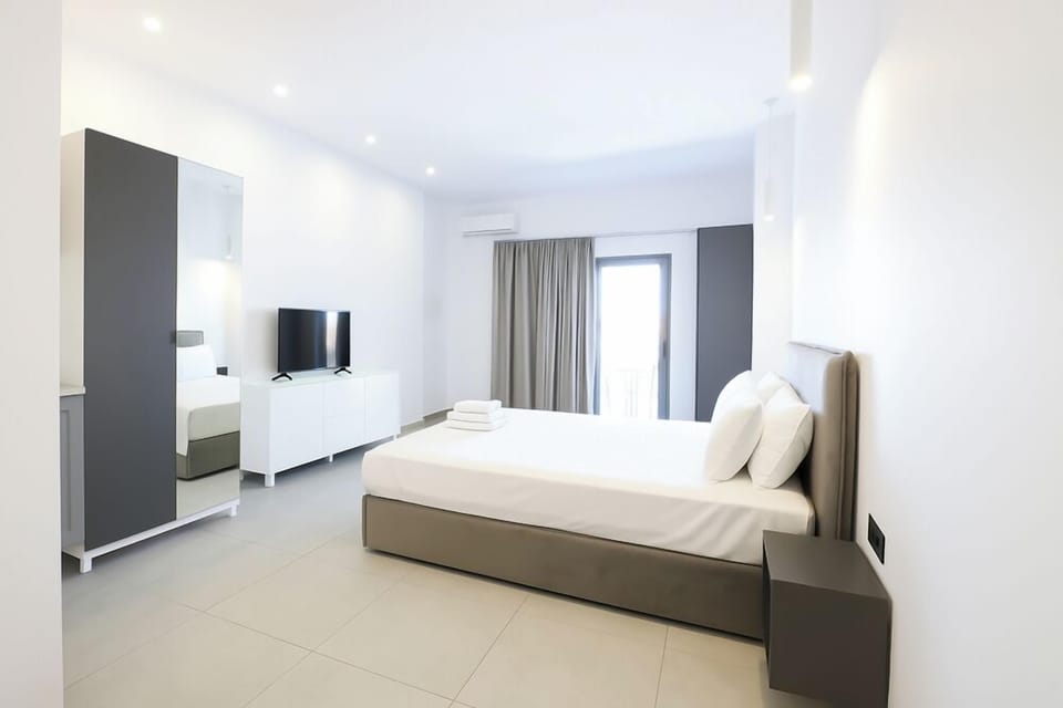 Standard Quadruple Room, Balcony, Sea View | Minibar, blackout drapes, soundproofing, iron/ironing board