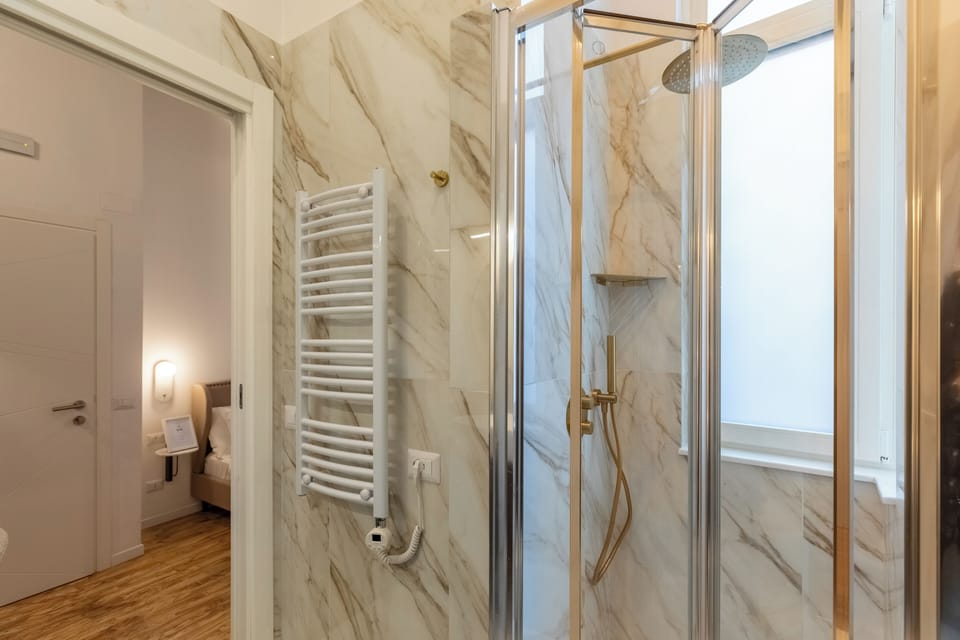 Shower, free toiletries, hair dryer, bathrobes