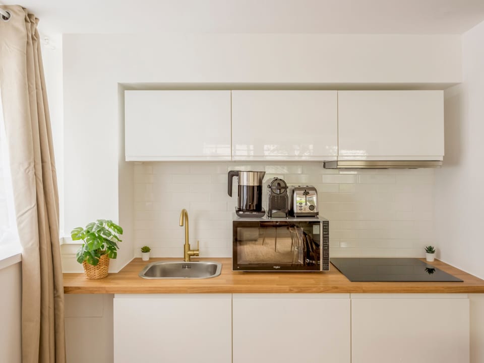 Apartment, Garden View | Private kitchen | Fridge, microwave, stovetop, electric kettle