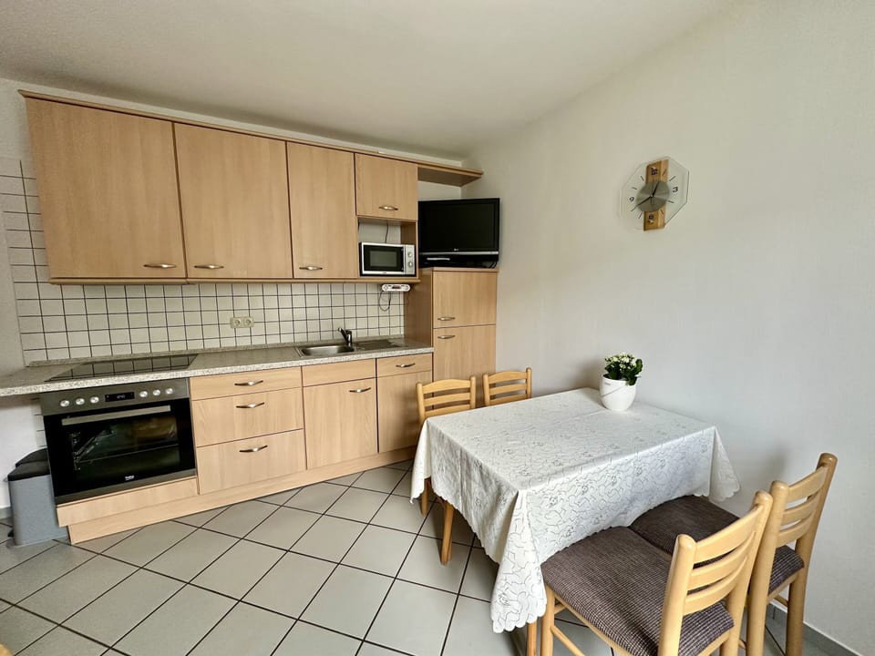 Classic Apartment, 2 Bedrooms | Private kitchen | Coffee/tea maker, fridge, microwave, oven